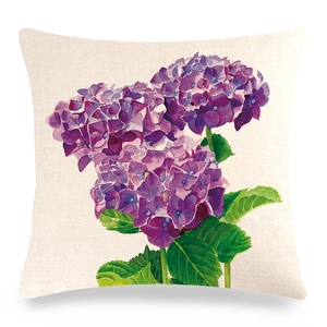 Detailed close-up of linen cushion cover with purple hydrangea floral watercolor print
