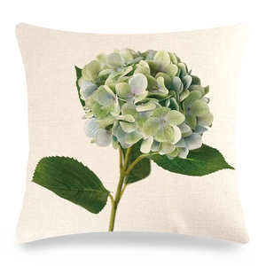 Detail of linen pillowcase featuring a realistic green hydrangea floral print texture