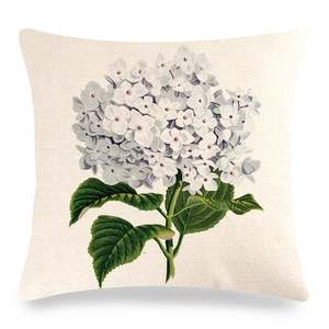 Detailed close-up of linen pillowcase with hydrangea floral pattern and fabric texture