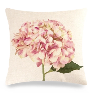 Detail of linen pillowcase featuring a realistic pink hydrangea floral print and fabric texture