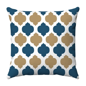 Detail of soft square pillow cover with navy and gold geometric quatrefoil pattern