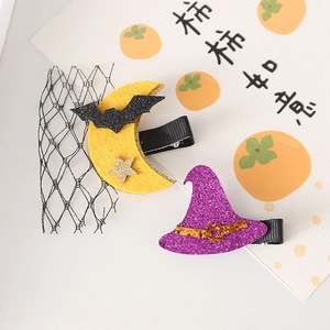 Halloween hair clips set featuring a yellow moon with bat and a purple wizard hat accessory
