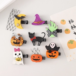 Set of 8 Halloween hair clips featuring pumpkin, ghost, and bat designs with sequins