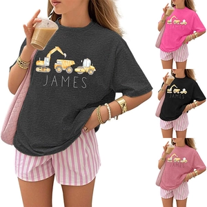 Close-up of James cartoon print t-shirt and striped shorts summer two-piece outfit