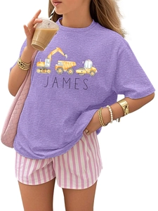 Detail of purple cotton T-shirt featuring cartoon construction vehicles and James text