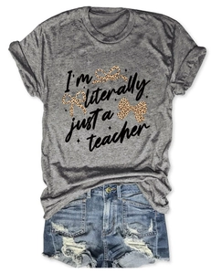 Close-up of a teacher-themed gray T-shirt with leopard bows and star graphics