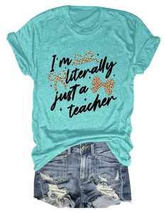 Detail of blue cotton t-shirt with I'm literally just a teacher text and leopard bow