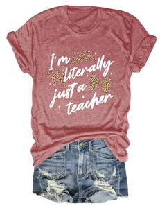 Detail of cotton teacher T-shirt with leopard bow and distressed denim shorts