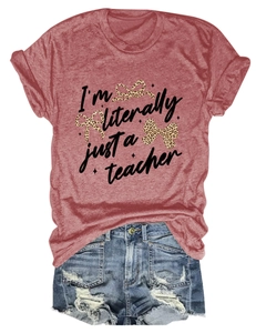 Flat lay of a rust red t-shirt with a leopard print bow and denim shorts