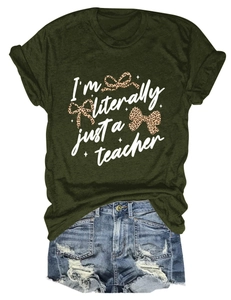 Close-up of green teacher T-shirt and distressed denim shorts with leopard bow graphics