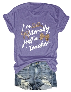 Detail view of purple crew neck T-shirt featuring 'I'm literally just a teacher' text