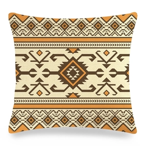 Vue détaillée d'une housse de coussin en lin aux motifs ethniques géométriques orange