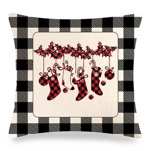 Christmas buffalo plaid pillowcase with festive stockings and bells on linen texture