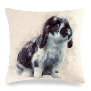 Detailed close-up of rabbit illustration on linen cushion cover for home decor