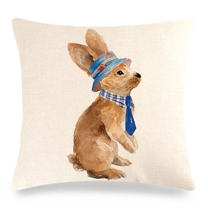Close-up of linen Easter pillow cover with watercolor rabbit in a blue hat