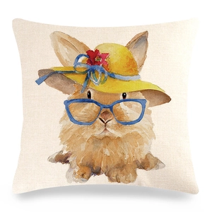 Detailed macro view of the linen texture and artistic watercolor bunny print on pillow cover