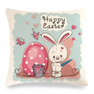 Detailed texture of linen Easter pillowcase featuring a cute bunny and Happy Easter egg