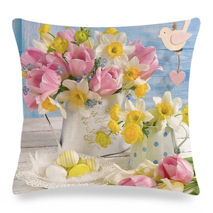 Detailed view of Easter linen pillowcase with floral watering can and colorful eggs
