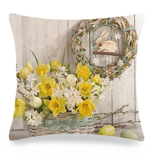 Easter pillow cover with floral basket eggs and rabbit on linen wood grain background