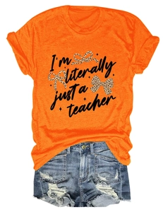 Close-up of orange teacher t-shirt with leopard bows and distressed denim shorts