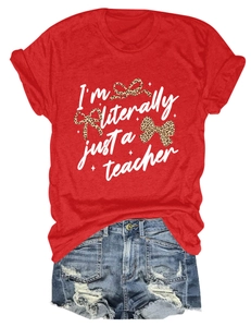 Detail of red crew neck T-shirt with teacher print and distressed denim shorts