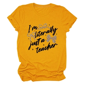 Detail of mustard yellow t-shirt with leopard bows and teacher slogan print