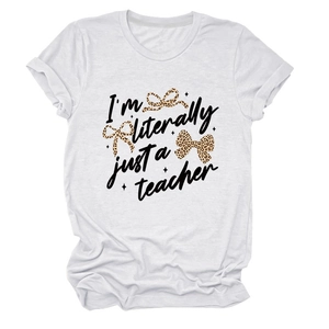 Detail of soft white cotton T-shirt featuring I'm literally just a teacher text and leopard bows