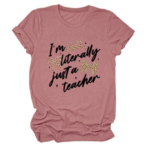 Close-up of dusty rose T-shirt with teacher slogan and leopard print bows detail