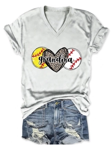Detail of V-neck white tee with leopard heart and grandma print with denim shorts