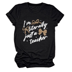 Detail of soft black cotton T-shirt featuring I'm literally just a teacher text and bows