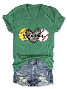 Detail of green V-neck T-shirt with leopard heart print and grandma text design
