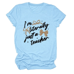 Light blue teacher theme t-shirt with leopard bows and star print in a flat lay view