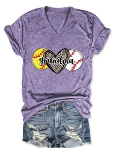 Close-up of purple V-neck t-shirt with leopard heart and softball grandma graphic