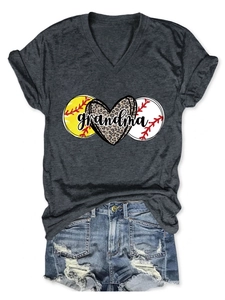 Detail of V-neck grey grandma T-shirt with leopard heart print and denim shorts