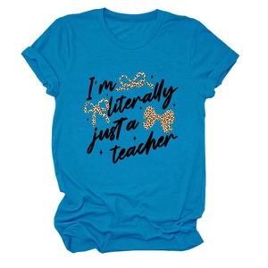 Detail of blue cotton T-shirt featuring leopard bows and I'm literally just a teacher text
