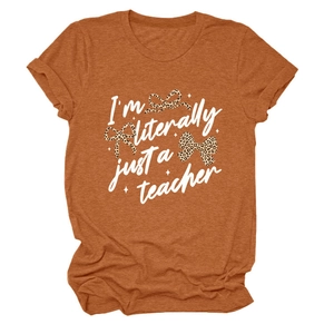 Detail of caramel cotton T-shirt with I'm literally just a teacher and leopard bows