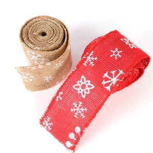 Christmas burlap ribbon rolls with white snowflake patterns for gift DIY decor