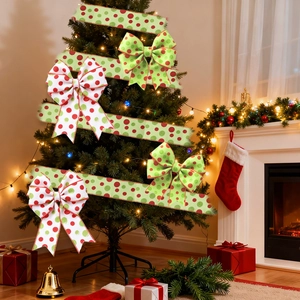 Red green and white polka dot Christmas ribbons on a decorated tree with gift boxes