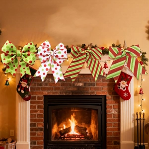 Christmas bows set with red and green stripes and polka dots on a fireplace mantel