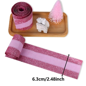 Detail of 6.3cm pink glitter ribbon for gift wrapping and festive decoration
