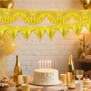 Close-up of golden foil fringe banners with semicircle and triangle shapes for party decor