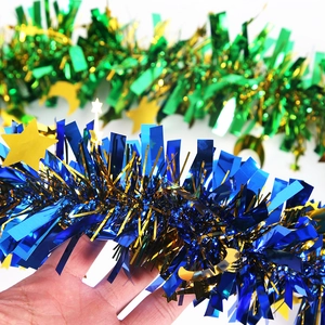 Blue and green tinsel garland with gold stars and moon sequins for Eid holiday decorations