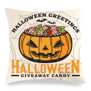 Detail van Halloween kussensloop met pompoen snoep print en spinnenweb texturen