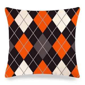 Close-up of the coarse fabric texture and colorful argyle pattern on the square pillowcase