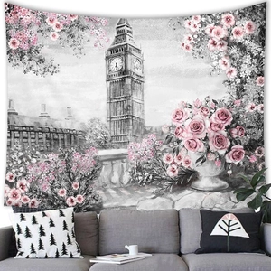 Detailed texture of black and white Big Ben tapestry with pink floral accents on wall