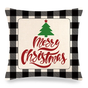 Détail de la taie d'oreiller de Noël à carreaux avec sapin vert et texte Merry Christmas