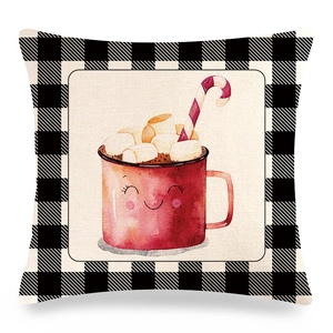 Detail of Christmas buffalo plaid pillowcase with watercolor mug and candy cane design
