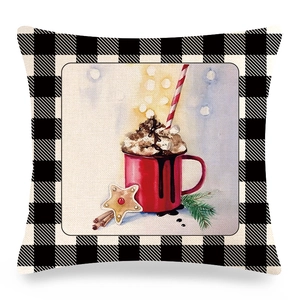 Close-up of linen pillow cover featuring watercolor Christmas mug and buffalo check border