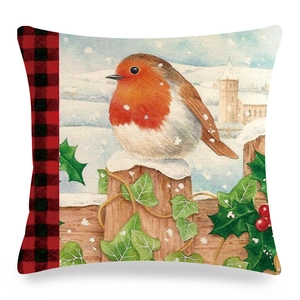 Detailed linen cushion cover featuring a winter robin bird on a fence with buffalo plaid trim