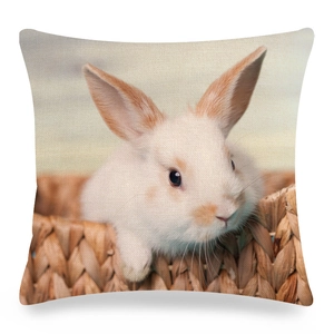 Detailed view of linen cushion cover texture with cute rabbit and basket print design